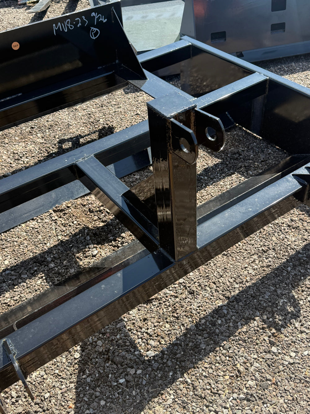 Land plane leveler lower link lugs and frame detail